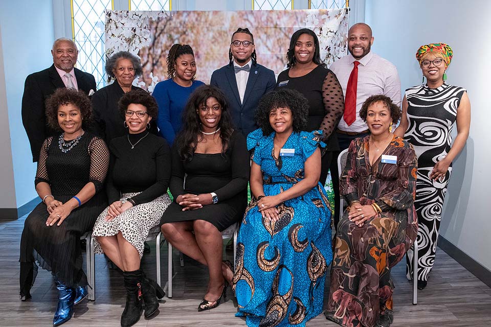 The BAA board poses for a photo at the annual prayer breakfast event.