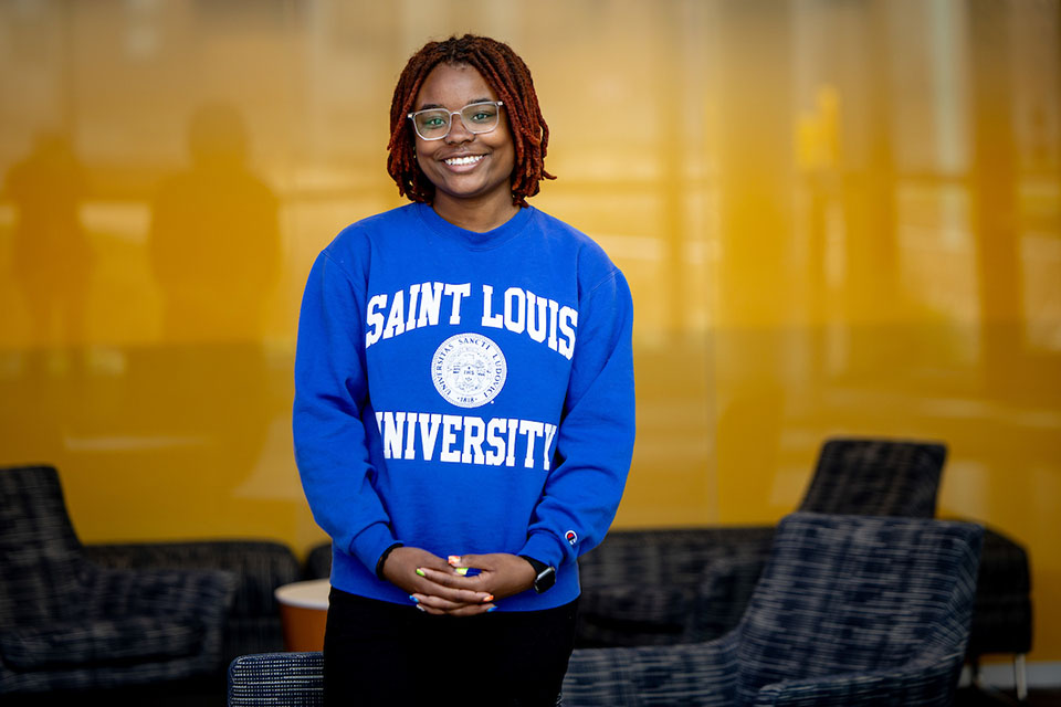 Malaisyah Vann Malaisyah Vann poses for a photo wearing a blue Saint Louis University sweatshirt.