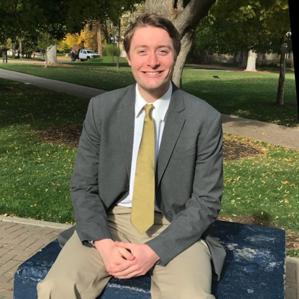 Hunter Baldridge smiling in a professional photo.