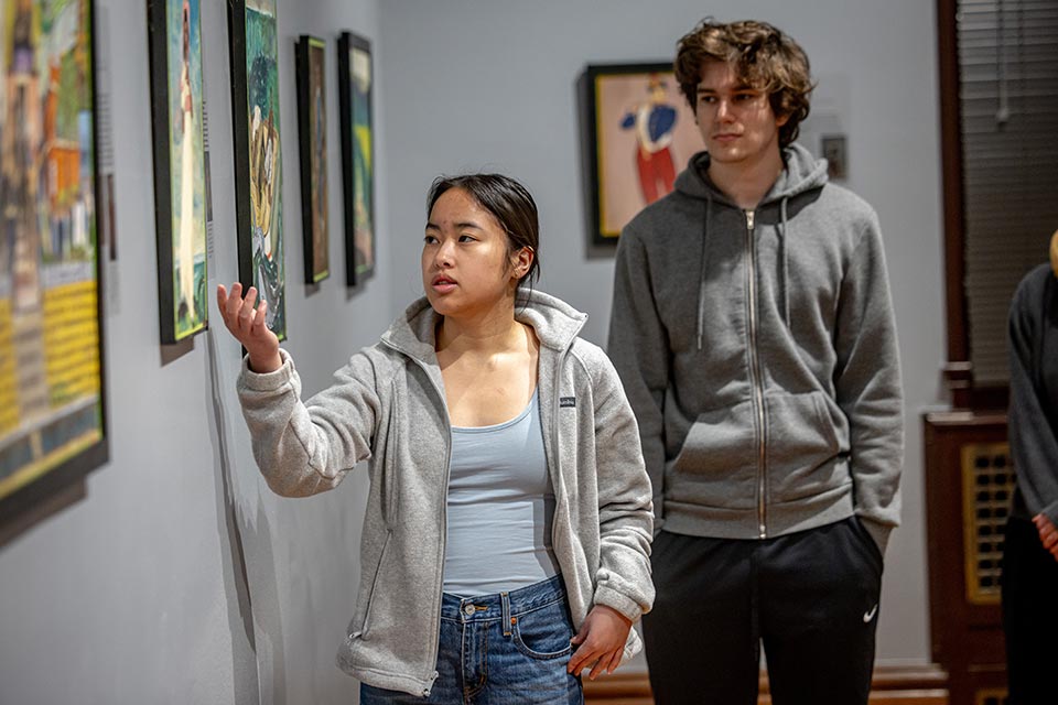 Students with paintings at SLUMA