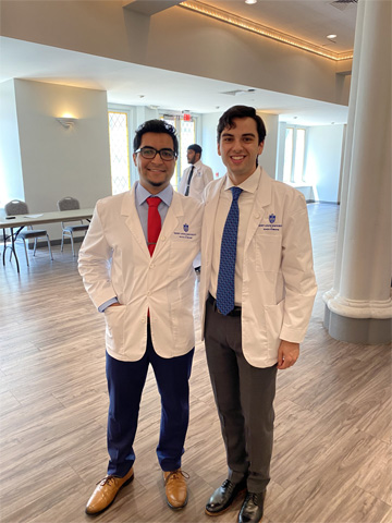 A group photo of both of the new MD/ PhD candidates A group photo of both of the new MD/ PhD candidates