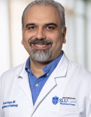 Headshot of Veysel Akgun