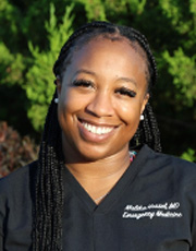 Headshot of Malika Hassell Headshot of Malika Hassell