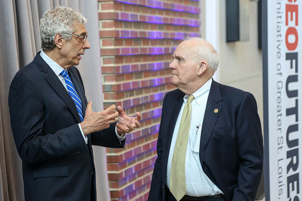 Pestello and Taylor at TGI Launch Annoucement SLU President Fred P. Pestello, Ph.D., speaks with Andrew C. Taylor, Executive Chairman of Enterprise Inc. and Founding Chair of Greater St. Louis Inc., after the launch of the Taylor Geospatial Institute on April 21, 2022. Photo by Sarah Conroy. .