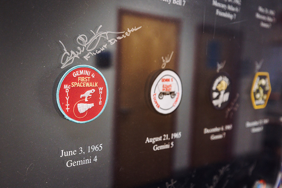 Gene Kranz's signature on a commemorative timeline in McDonnell Douglas Hall.
